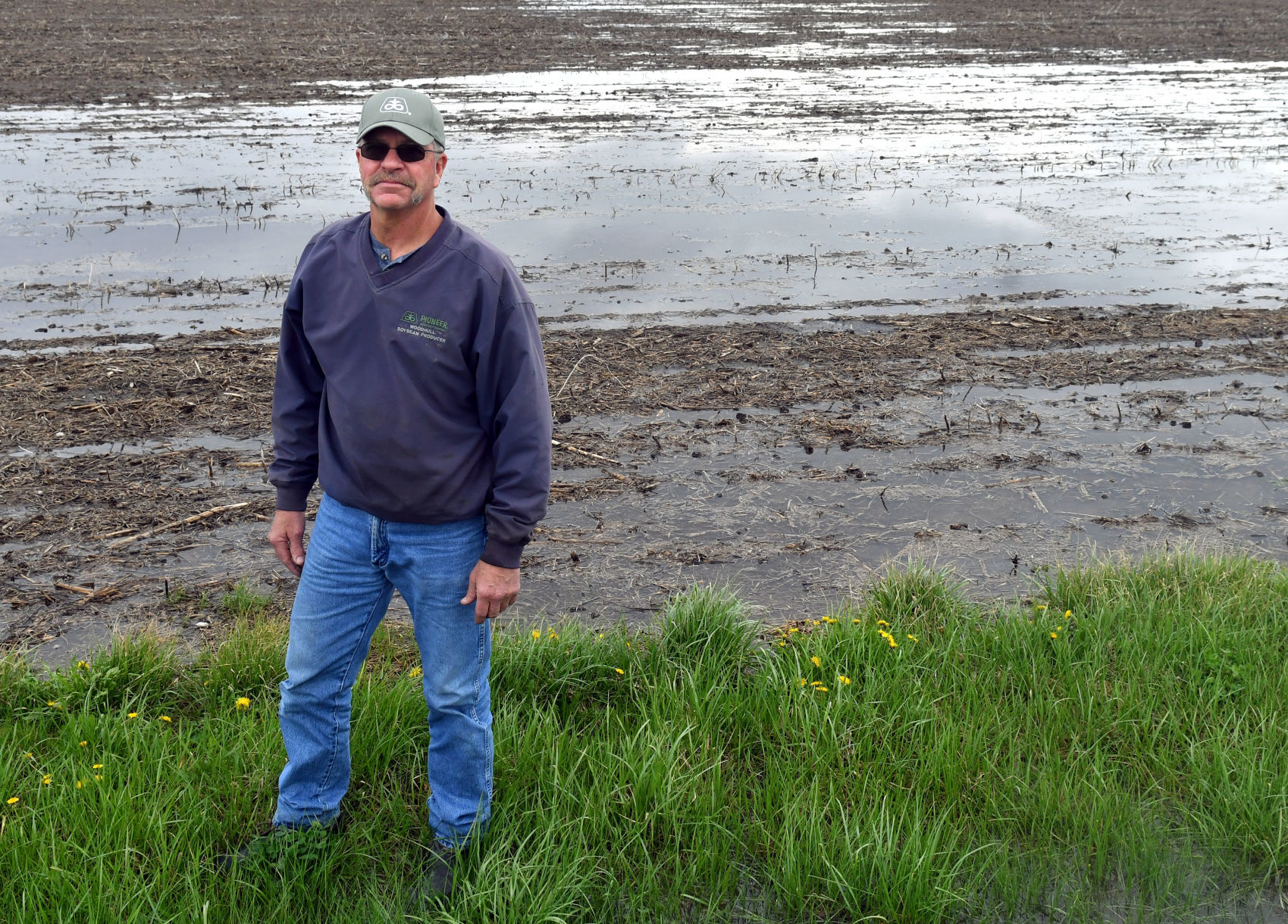 Farmers dealing with flooded fields.